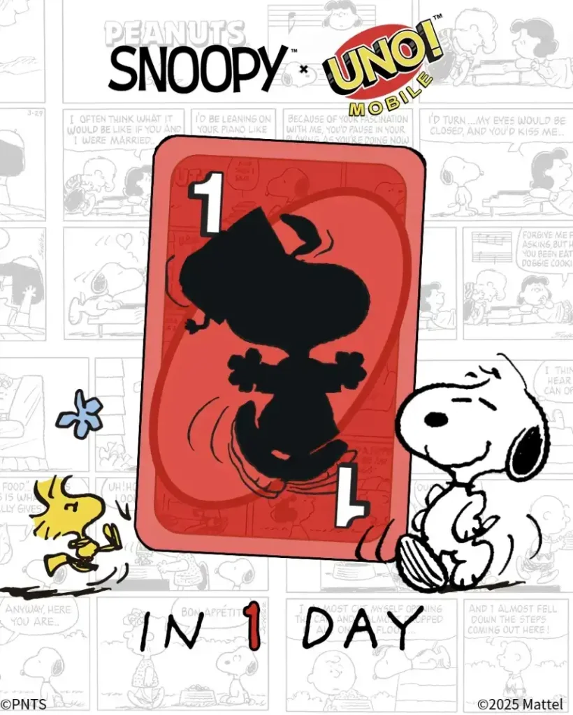 Uma imagem promocional vibrante apresenta um cartão Uno vermelho gigante com o tema Snoopy no centro. A carta tem uma silhueta preta de Snoopy dançando. No canto inferior esquerdo da carta está um grande número "1" branco e no canto inferior direito está uma letra "L" branca.