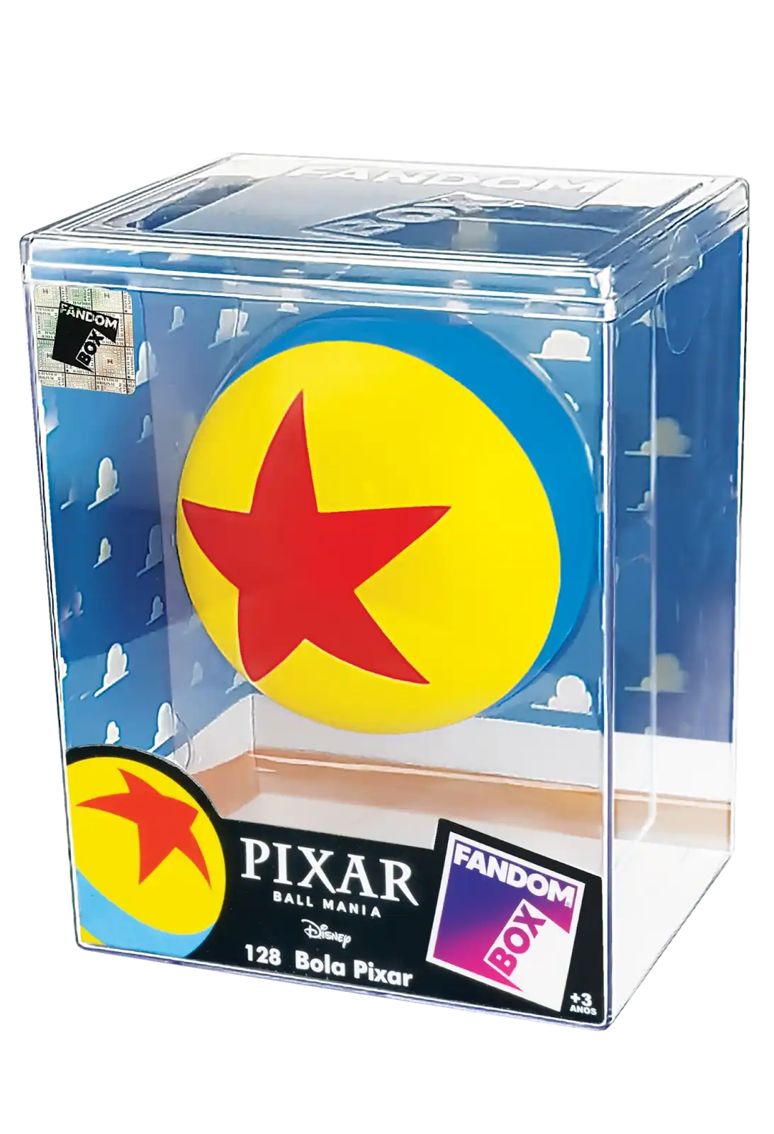Uma bola amarela com uma estrela vermelha no centro e uma faixa azul na horizontal. Ela está dentro de uma caixa transparente com a marca "Pixar Ball Mania" e "Fandom Box".