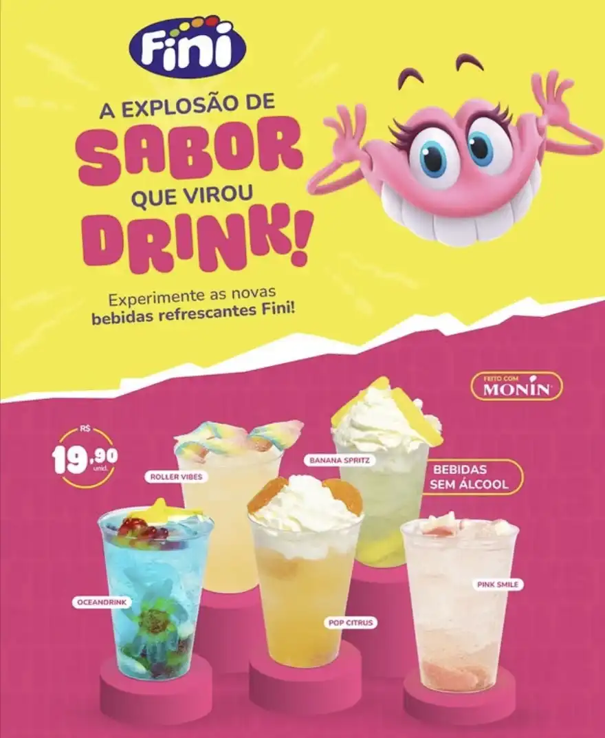 Uma imagem promocional colorida da Fini e Monin com o slogan "A explosão de sabor que virou drink!". A imagem mostra cinco novas bebidas sem álcool, disponíveis por R$ 19,90 cada. As bebidas são, da esquerda para a direita: Oceandrick, Roller Vibes, Pop Citrus, Banana Spritz e Pink Smile. No canto superior direito, há a mascote da Fini, uma criatura rosa e sorridente.