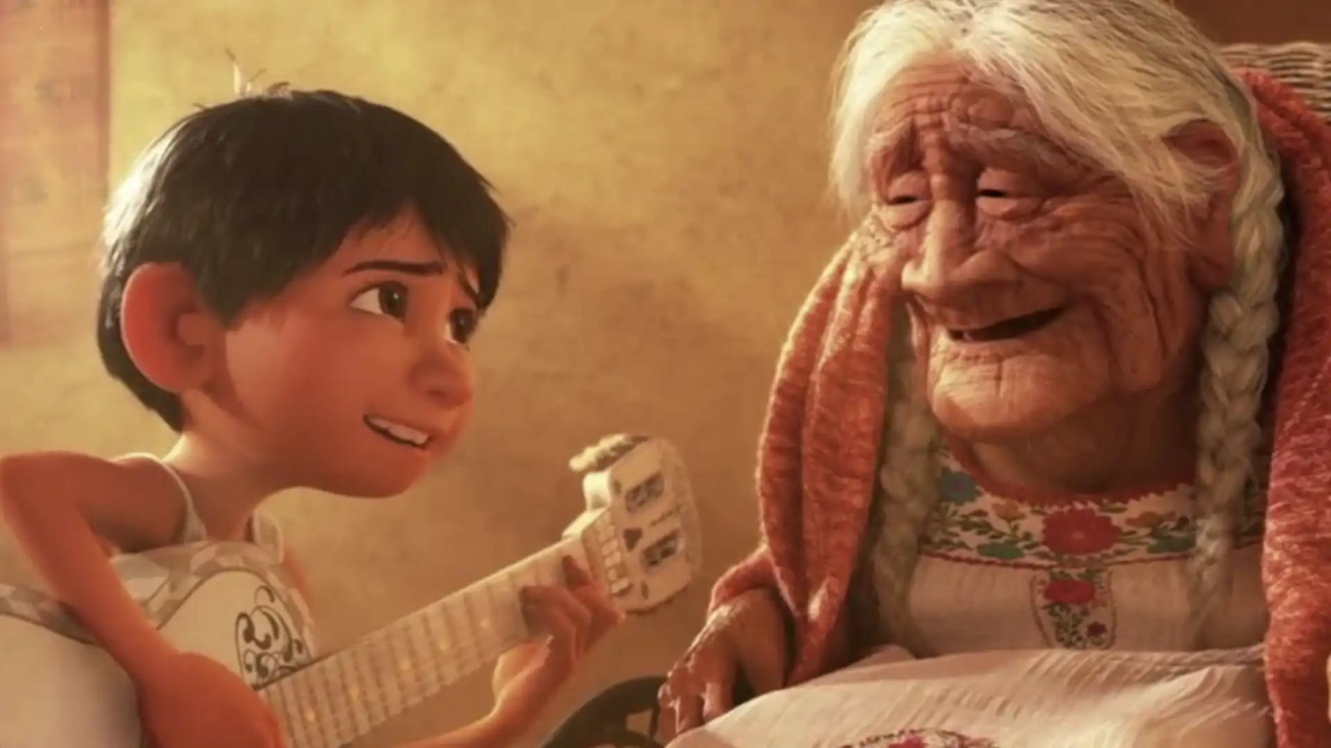 Miguel, do filme "Viva - A Vida É uma Festa", tocando violão para sua bisavó, Mamá Coco.