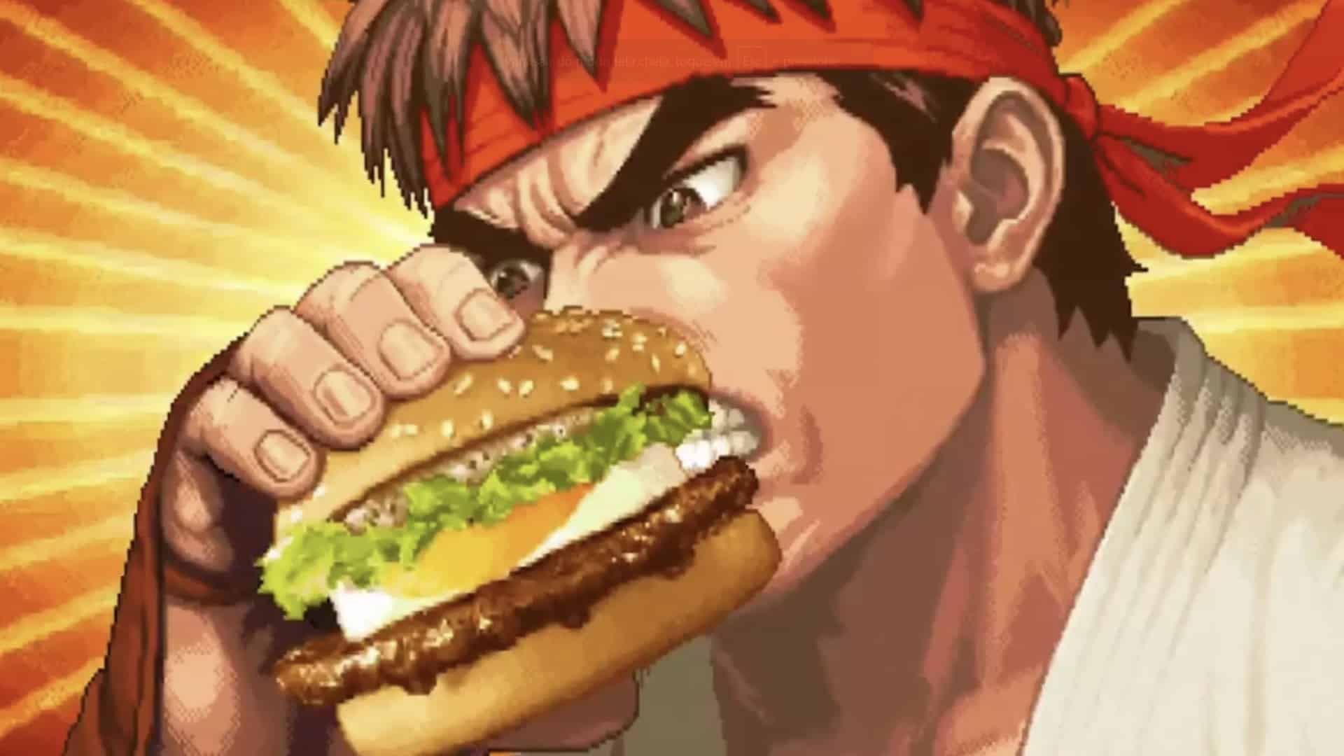 Ryu de Street Fighter II mordendo um hambúrguer do McDonald's.