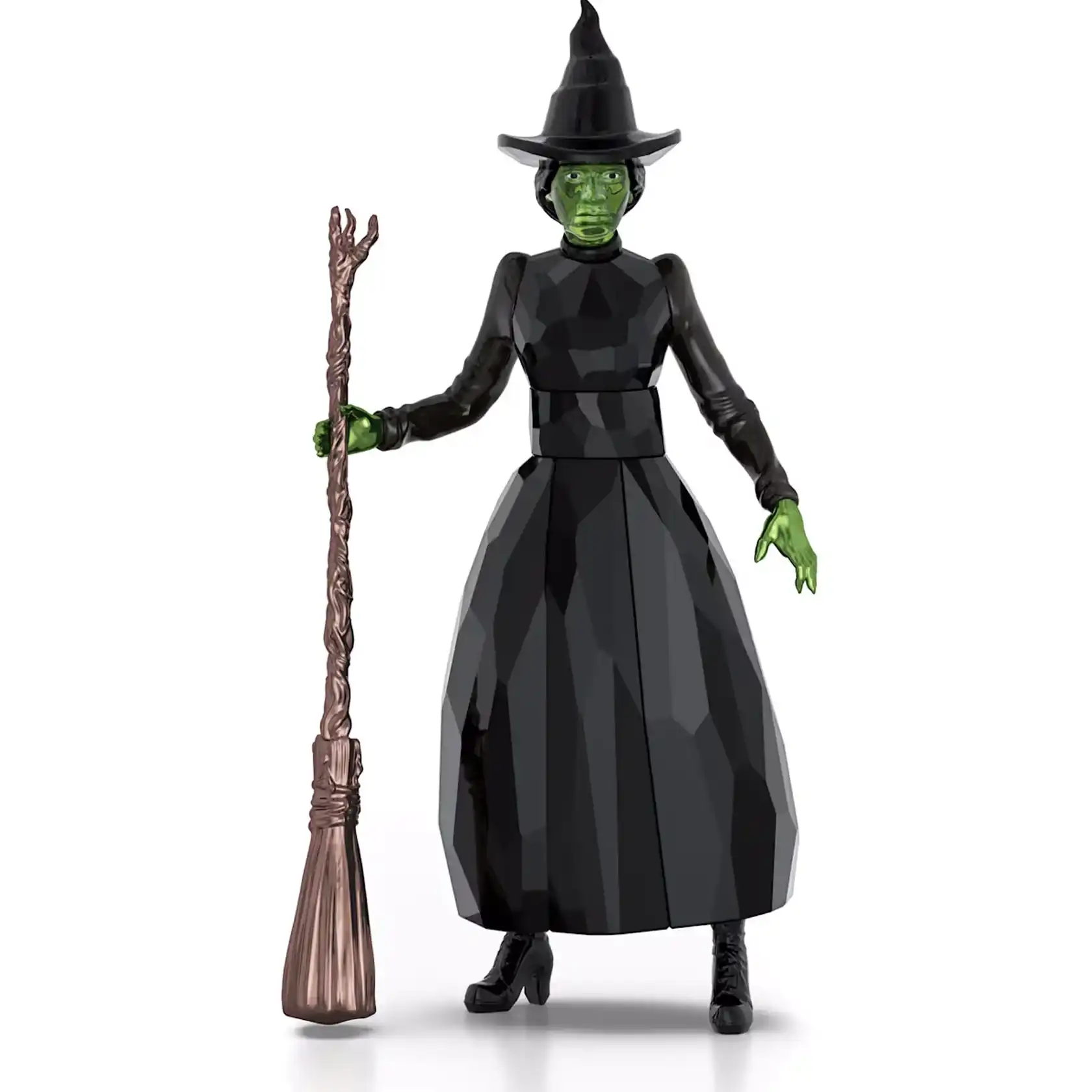 Estatueta Swarovski de Elphaba, a Bruxa Má do Oeste, com pele verde e vestido preto facetado, segurando uma vassoura.