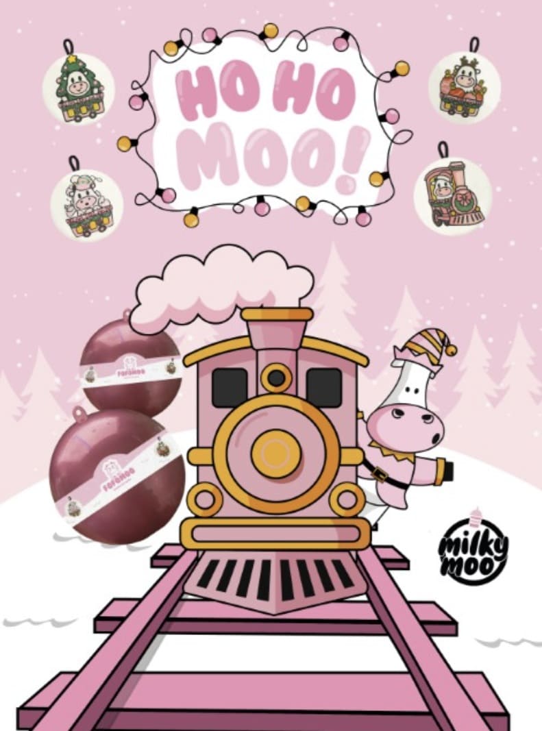 Banner de Natal Milky Moo: uma locomotiva rosa e dourada com uma vaca vestida de duende e a frase "HO HO MOO!". Enfeites de Natal em formato de vaca e esferas de chocolate.